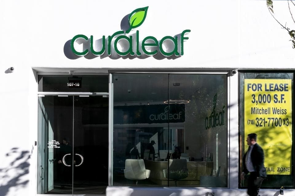 A pedestrian walks past Curaleaf Inc. store in the Queens borough of New York, U.S., on Thursday, Oct. 18, 2018. Curaleaf, a Massachusetts-based company backed by Moscow banking veteran Boris Jordan with roughly 30 pot stores open in 12 states, is raising $350 million through a private placement that values the company at about $4 billion. Photographer: Jeenah Moon/Bloomberg© 2018 BLOOMBERG FINANCE LP